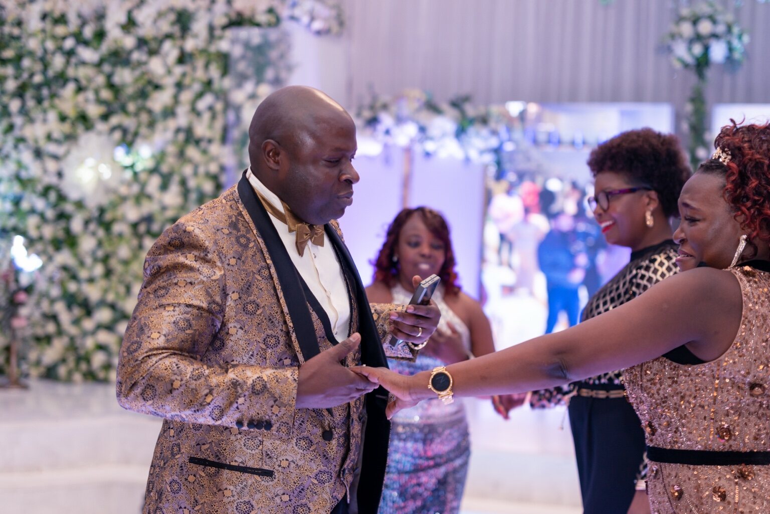 Guests connecting around the tables and across the venue at the 2024 Grille Community Christmas Gala