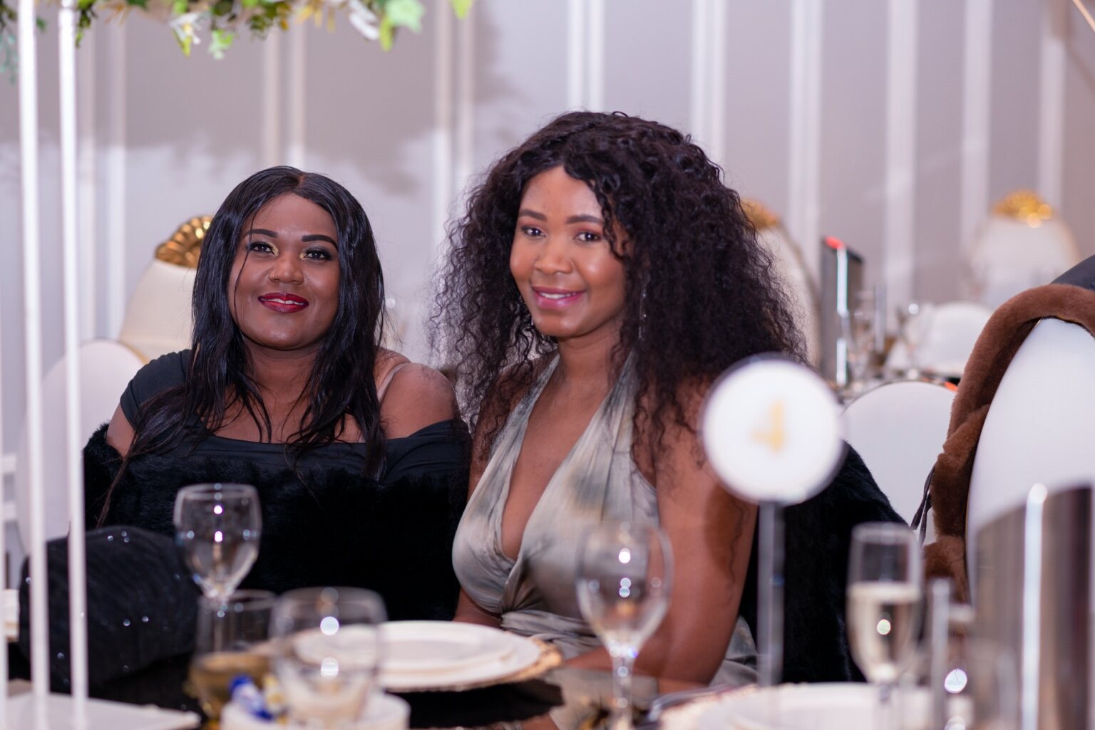 Guests connecting around the tables and across the venue at the 2024 Grille Community Christmas Gala