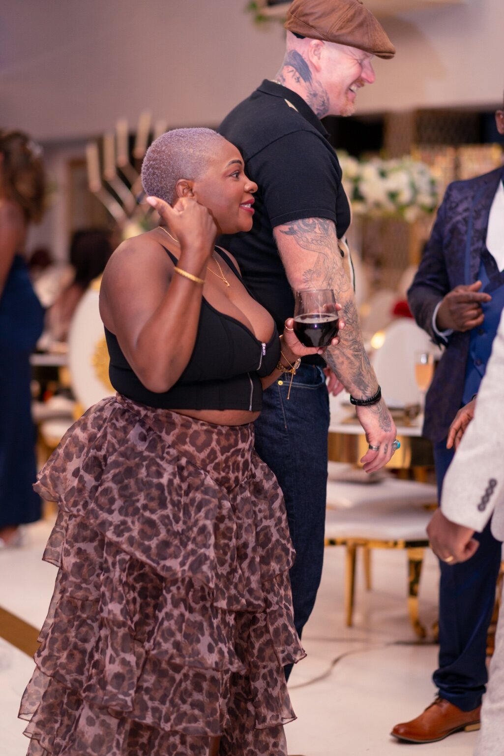 Guests connecting around the tables and across the venue at the 2024 Grille Community Christmas Gala