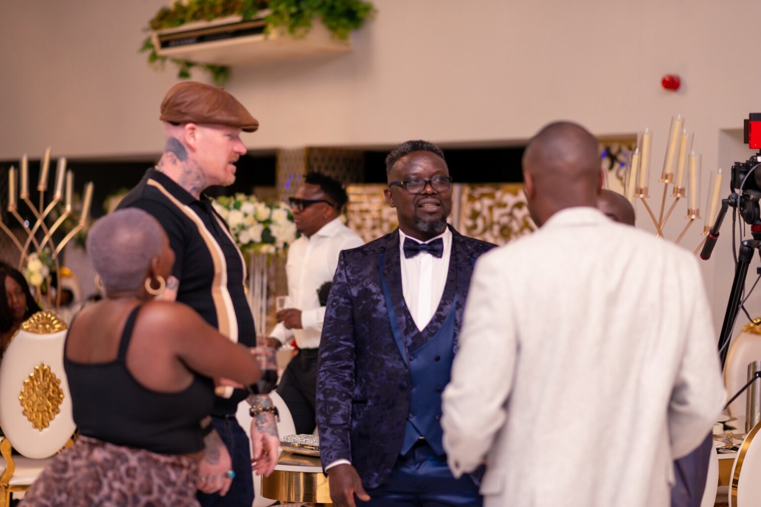 Guests connecting around the tables and across the venue at the 2024 Grille Community Christmas Gala