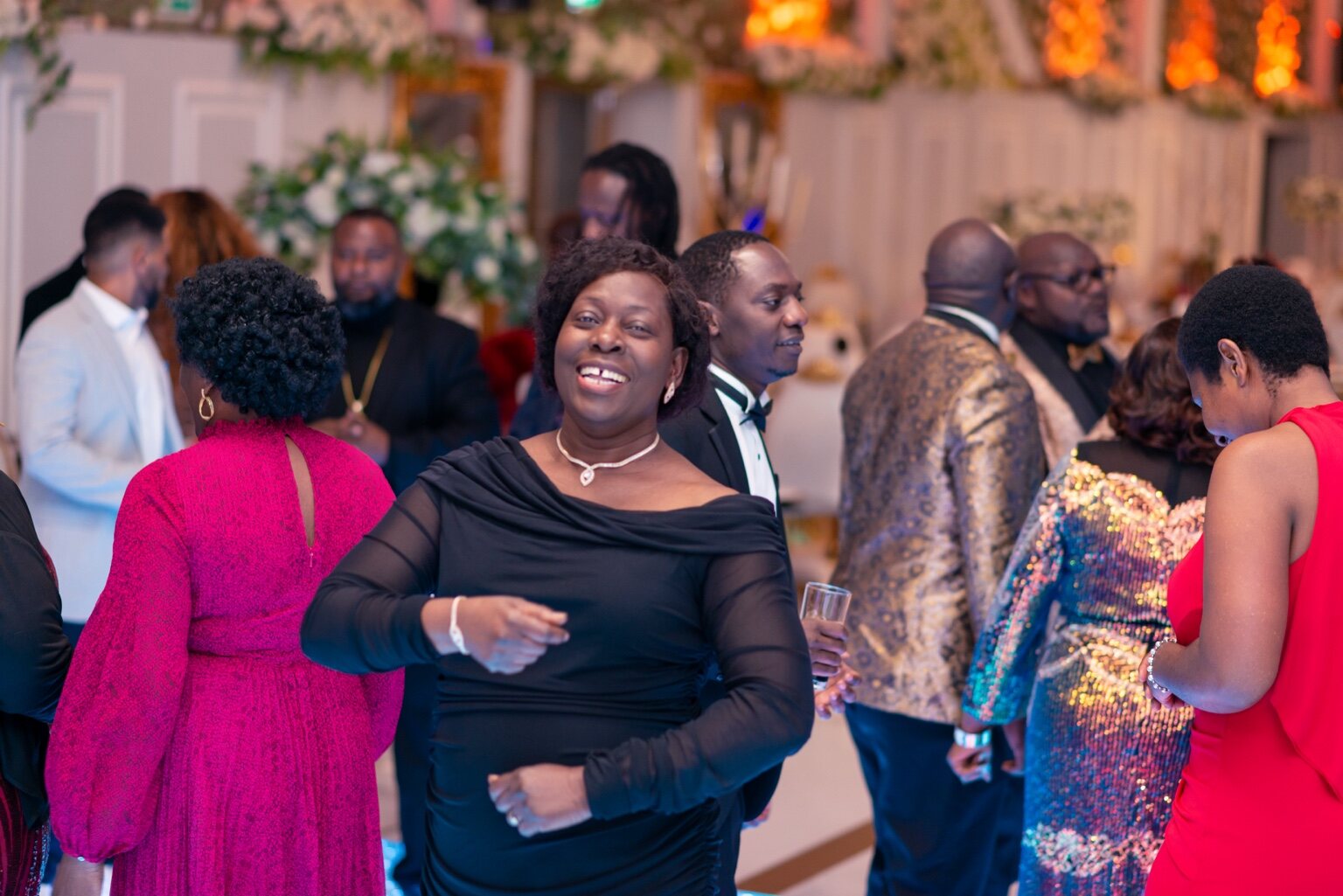 Guests connecting around the tables and across the venue at the 2024 Grille Community Christmas Gala