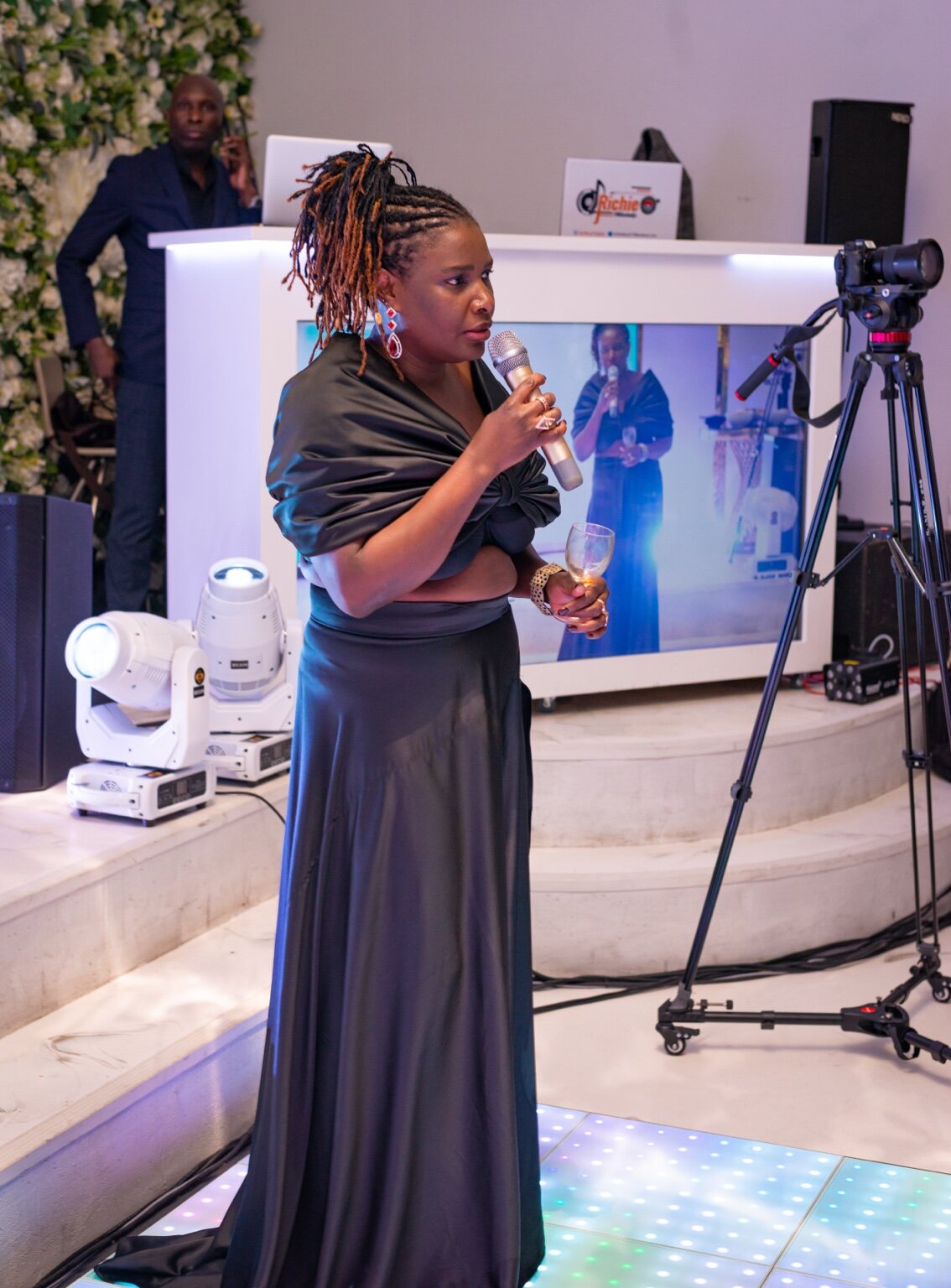 A vocalist performing for gala guests at the 2024 Grille Community Christmas Gala
